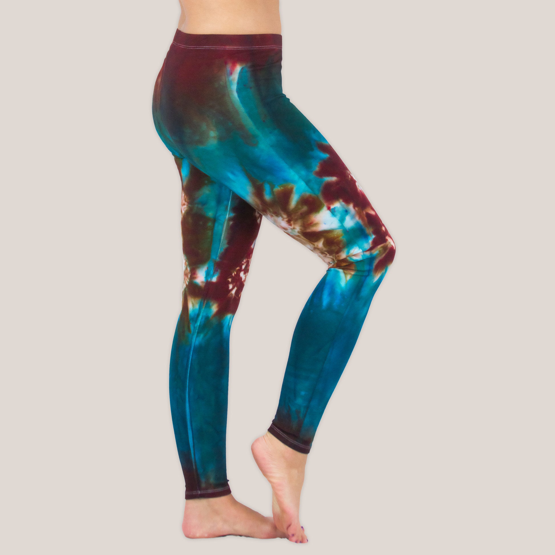 Teal and brown tie dye leggings by Akasha Sun.