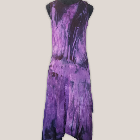 Purple tie-dye dress on a beige background