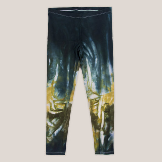 Black and gold tie dye leggings by Akasha Sun.