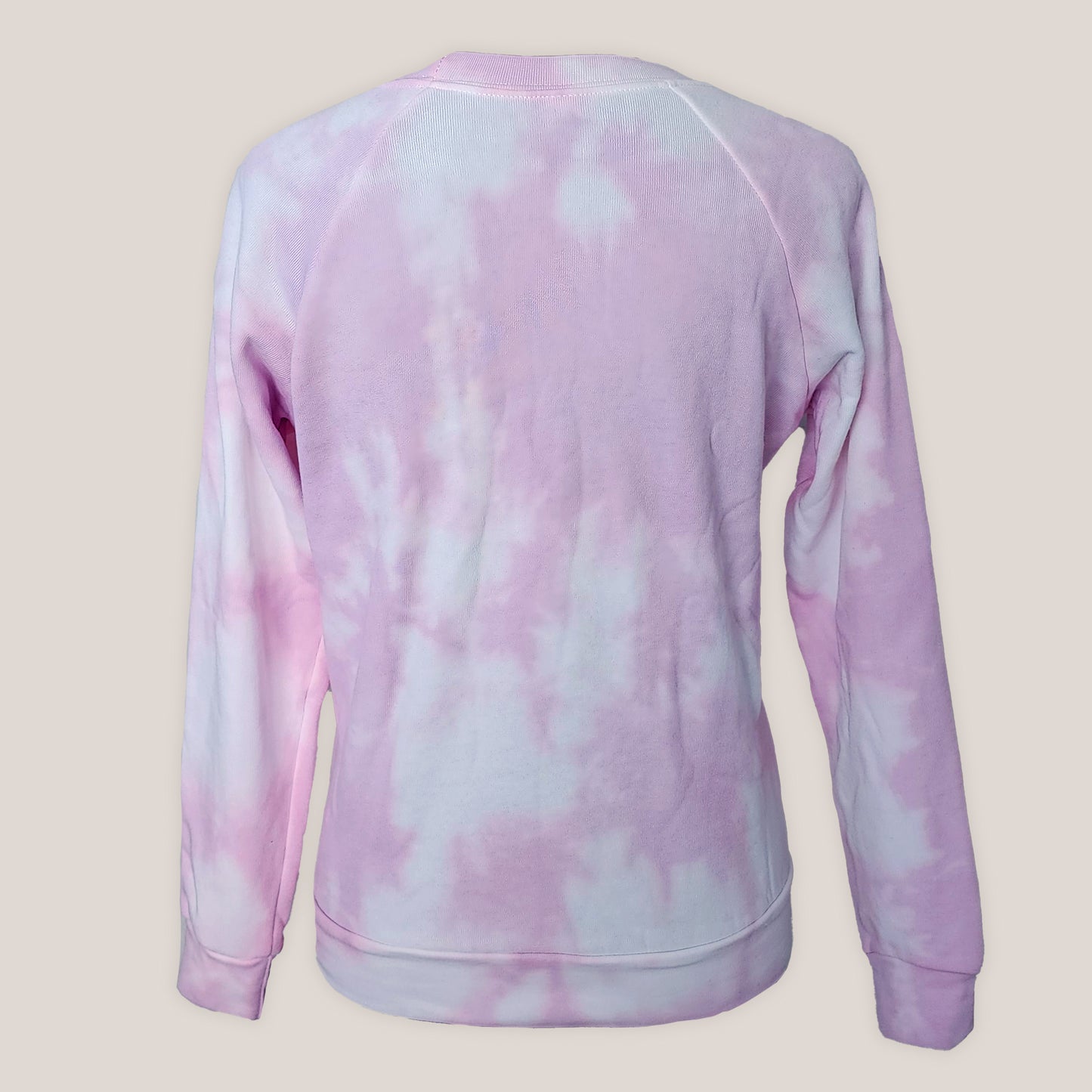 Pink tie-dye sweatshirt on a beige background