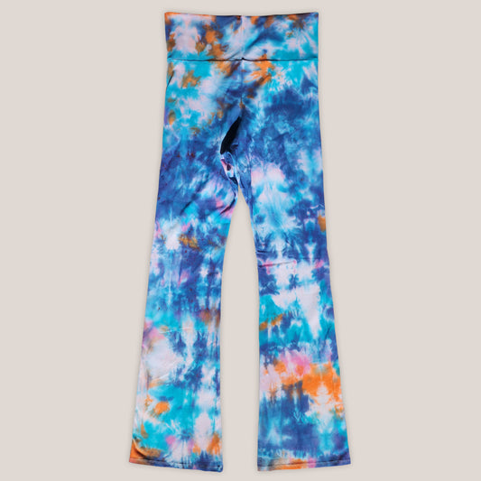 Colorful tie-dye leggings on a light gray background
