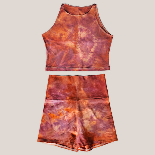 Tie-dye crop top and shorts set on a beige background