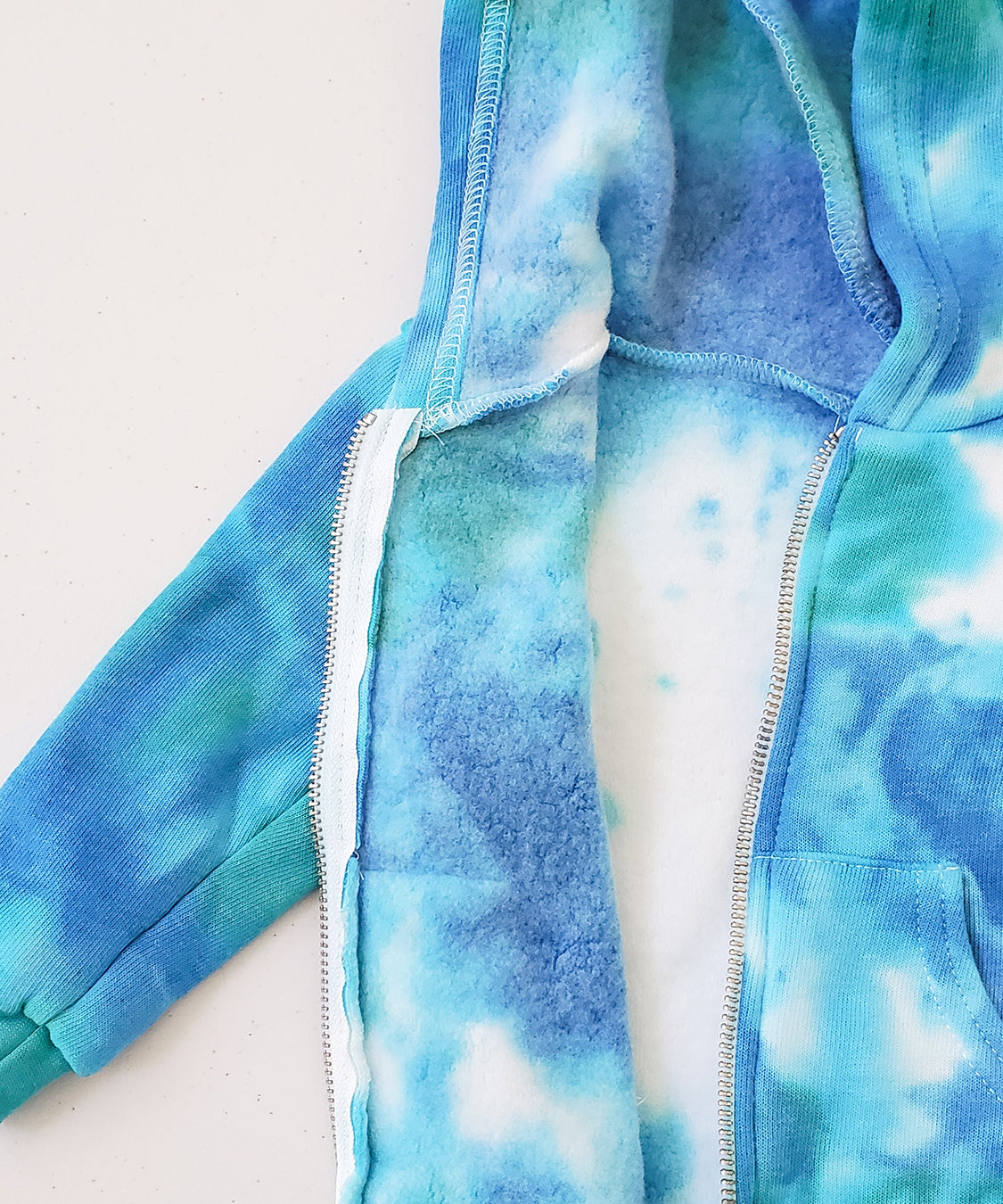 Blue and teal tie dye baby jacket.