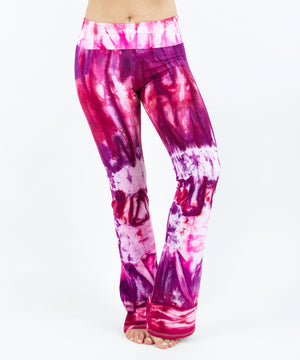 Pink, red, and purple tie dye yoga pants with a wide waistband by Akasha Sun.