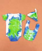 Blue, green, and white tie dye baby set that includes a bodysuit, hat, and bib.