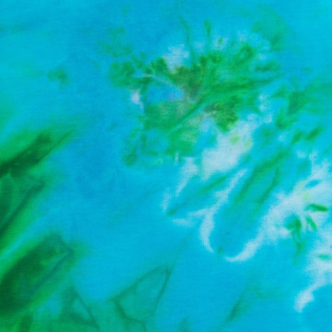 Blue and green tie dye crop top by Akasha Sun.