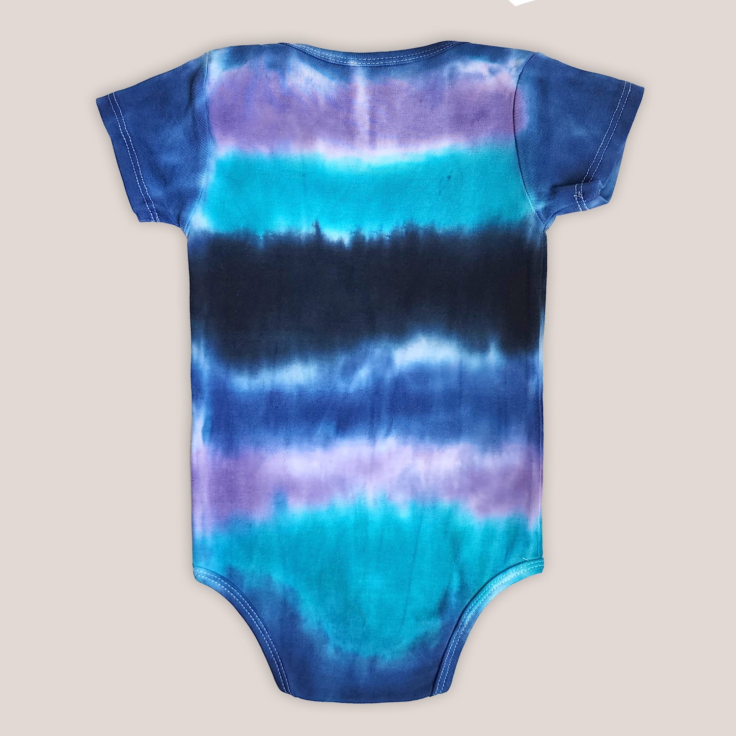 Colorado Dusk Organic Tie Dye Baby Bodysuit + Hat
