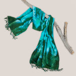 Teal and green tie dye scarf by Akasha Sun.