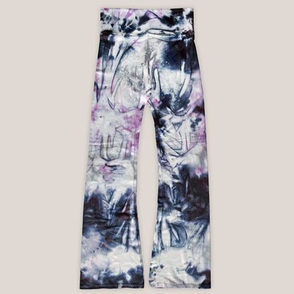 Tie-dye flare leggings with a plain background