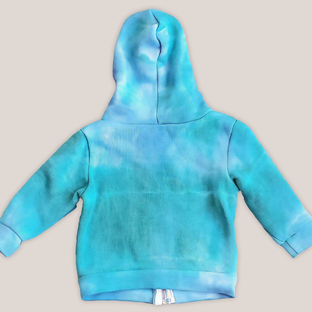 An aqua blue tie dye baby jacket with fleece interior, pockets, and hood.