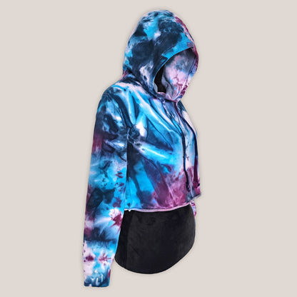 Hoodie with a tie-dye design on a beige background