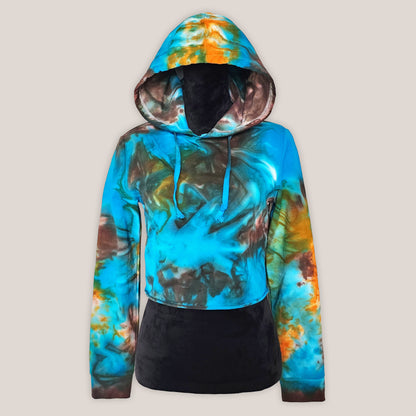 Tie-dye hoodie with blue and orange patterns on a light gray background