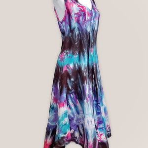 A teal, black, and purple tie dye dress.