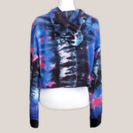 Blue, pink and black tie dye hoodie crop top with long sleeves and draw strings.