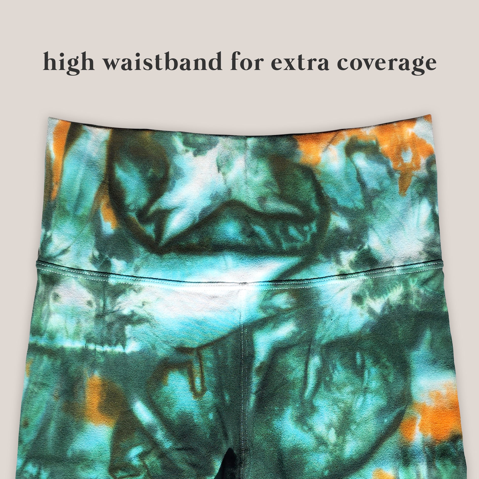 Tie-dye leggings with a high waistband on a light background