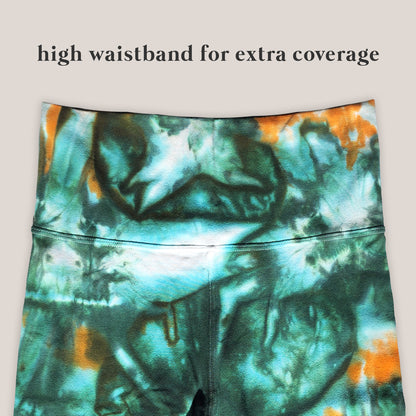 Tie-dye leggings with a high waistband on a light background