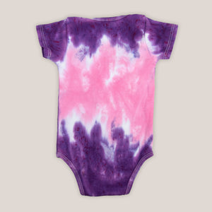 Purple and pink tie dye bodysuit by Akasha Sun.  Made of organic cotton.