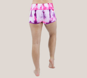 Pink and purple tie dye yoga shorts with a fold over waistband by Akasha Sun