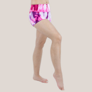 Pink and purple tie dye yoga shorts with a fold over waistband by Akasha Sun