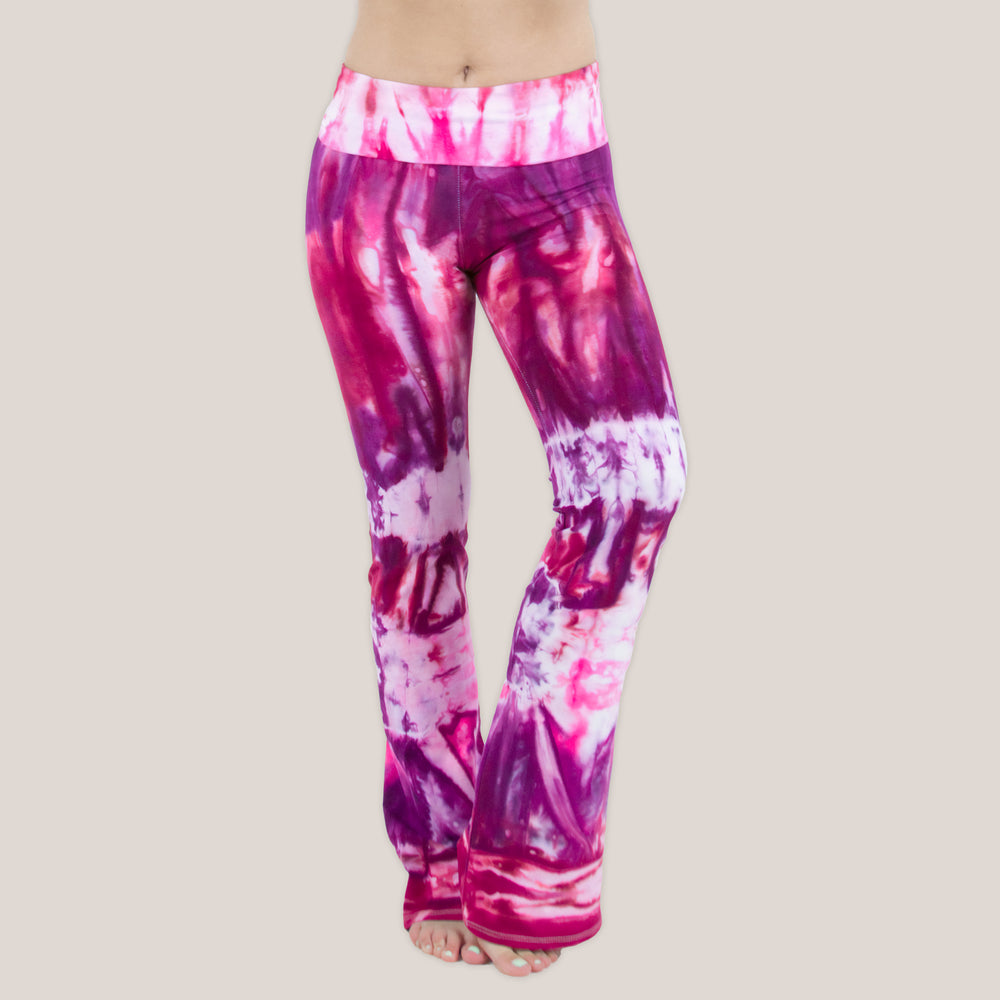 Pink, red, and purple tie dye yoga pants with a wide waistband by Akasha Sun.