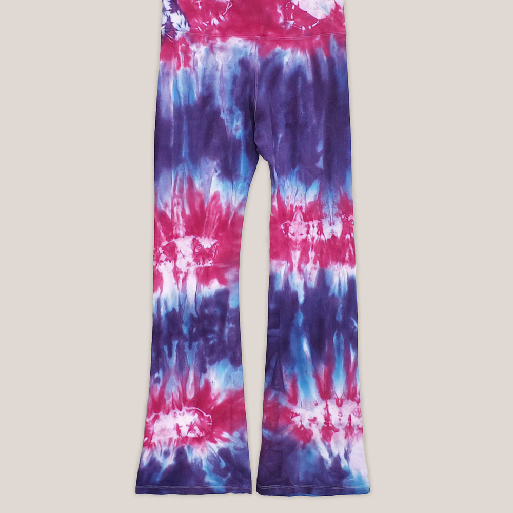 Purple and pink tie dye yoga pants with a wide waistband by Akasha Sun