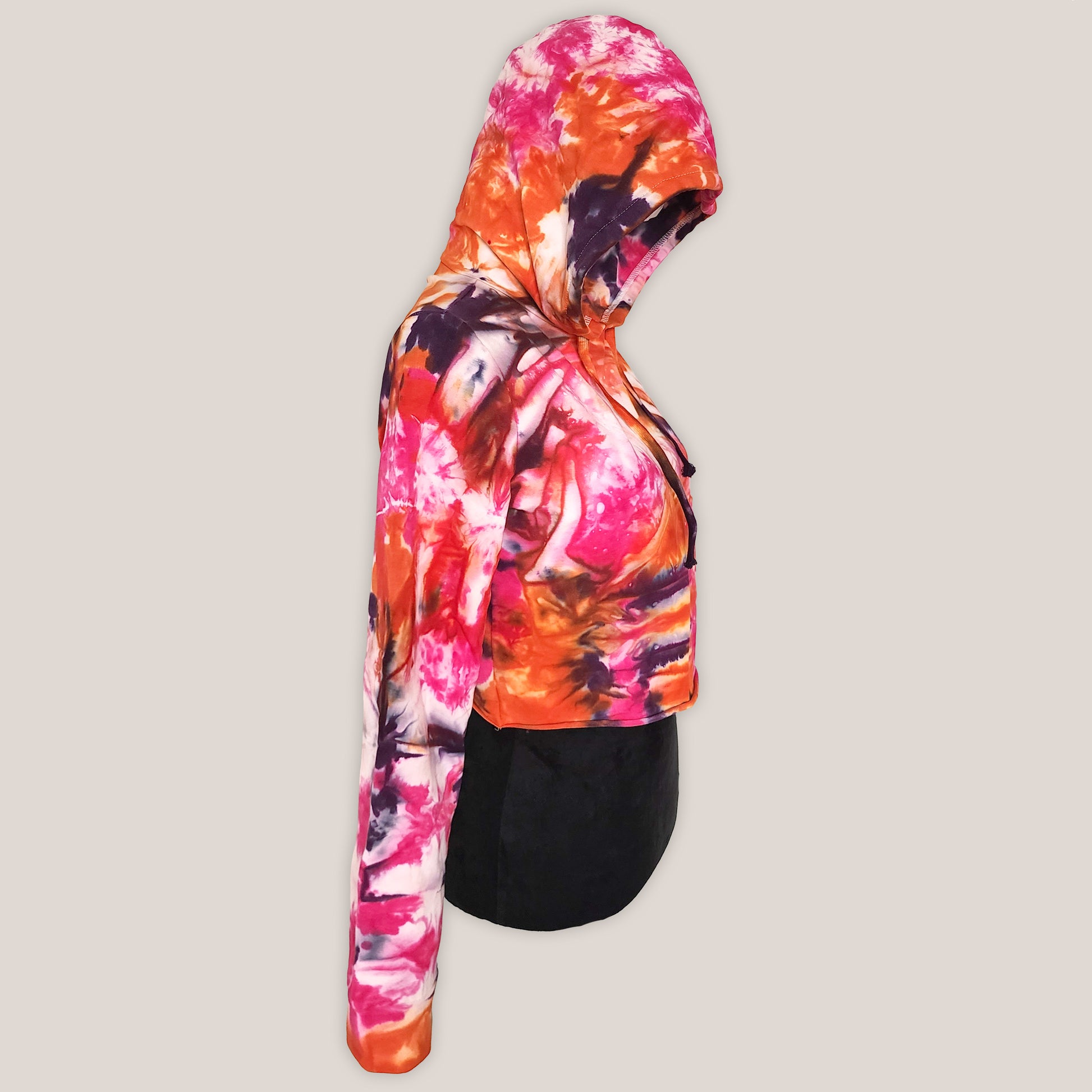 Colorful tie-dye hoodie on a plain background