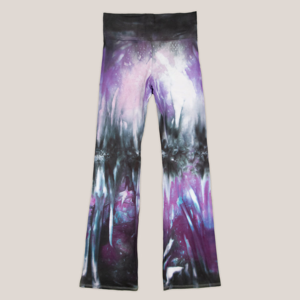 Purple and black tie dye yoga pants with wide waistband and flare bottoms by Akasha Sun.