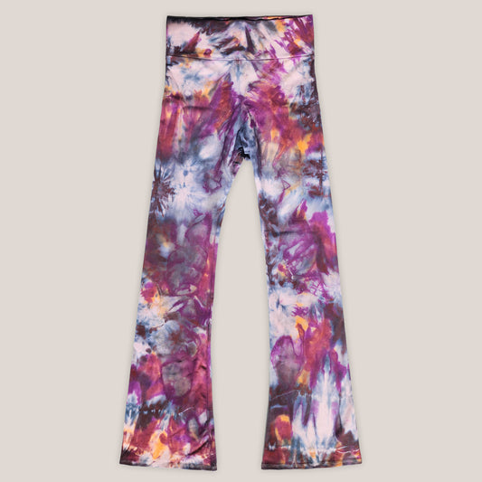 Colorful tie-dye leggings on a light gray background