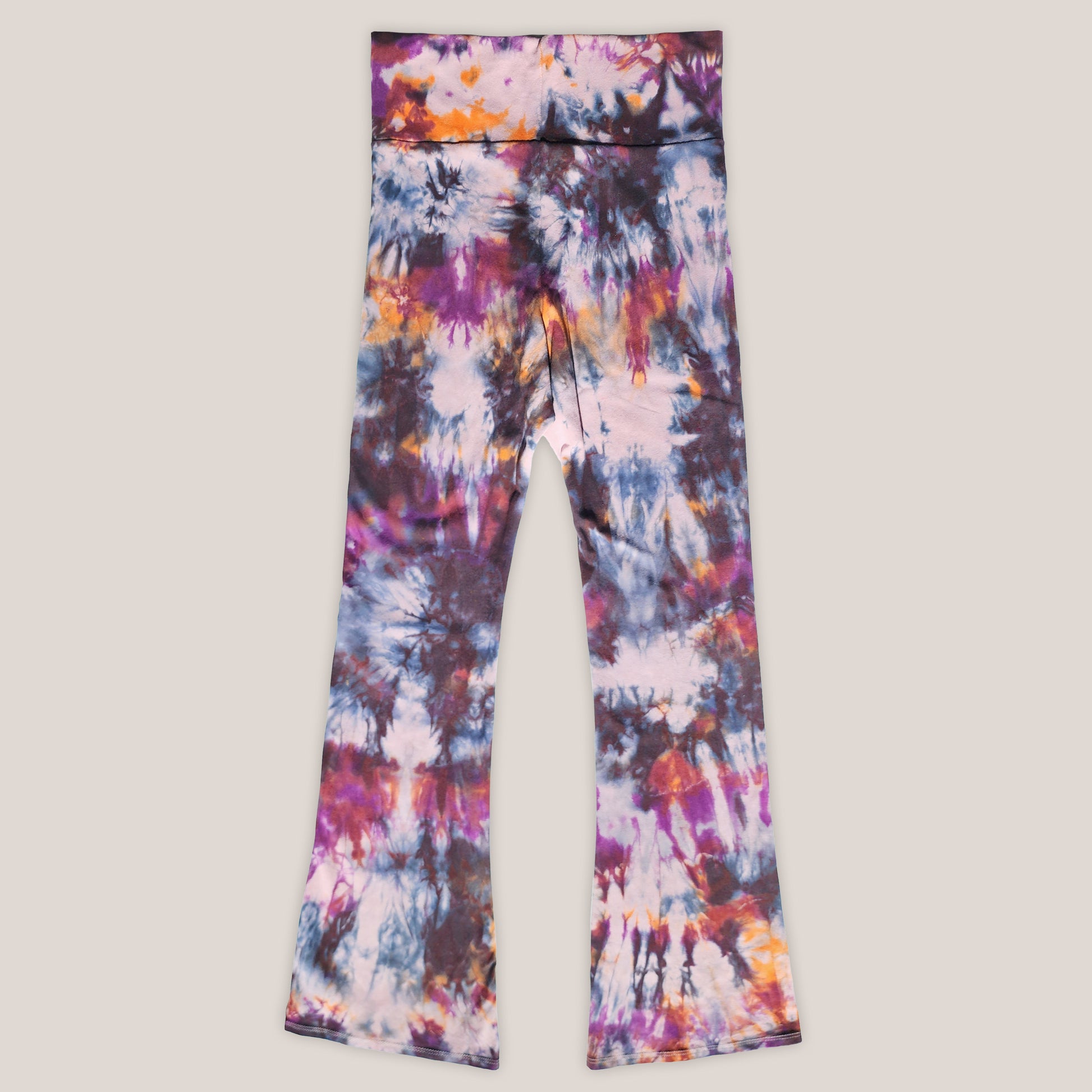 Colorful tie-dye leggings on a light gray background