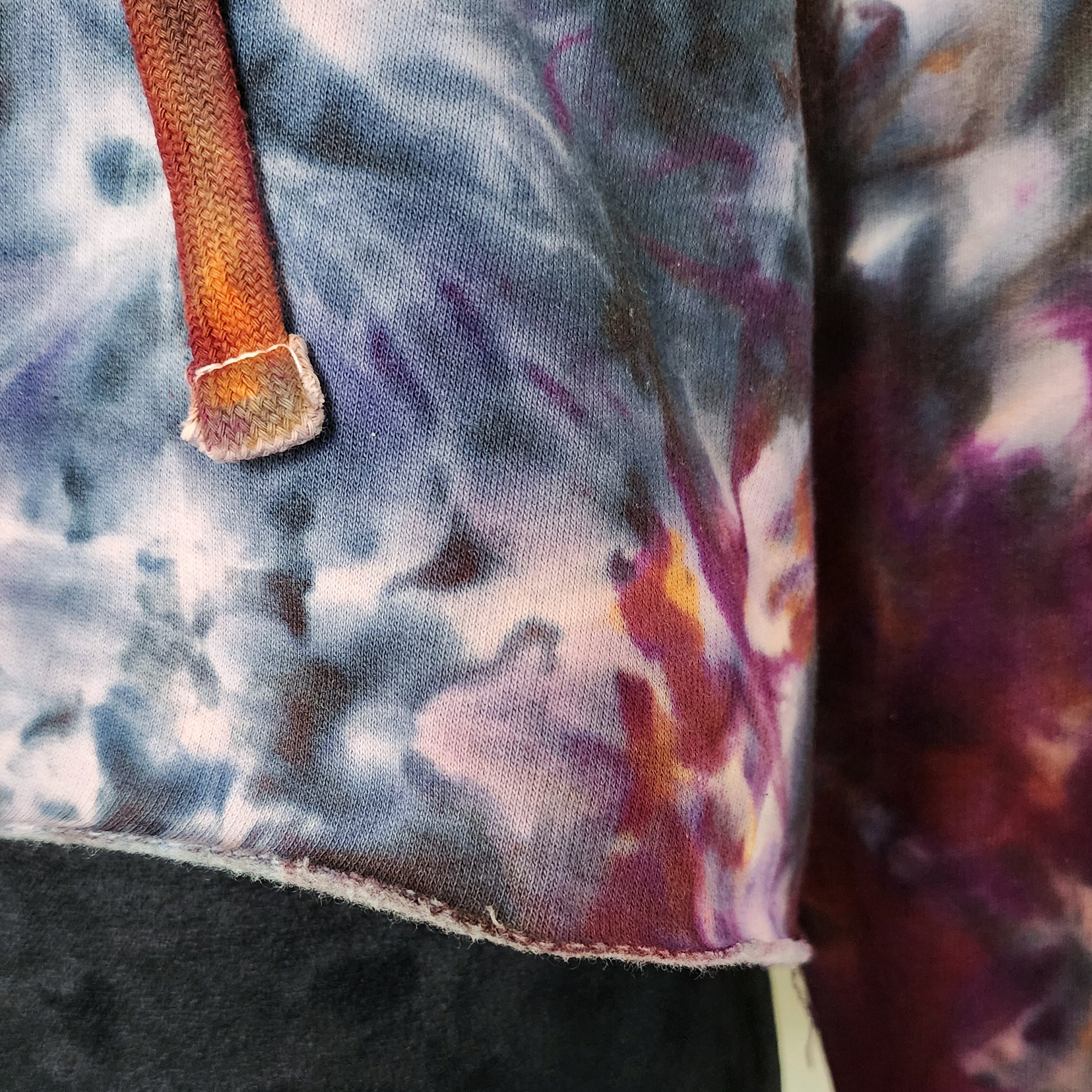 Close-up of a tie-dye fabric with a multicolor pattern