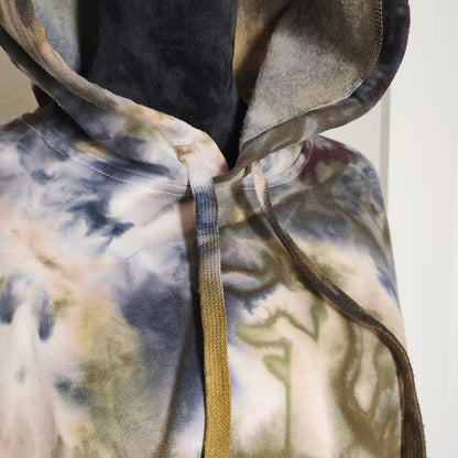 Tie-dye hoodie with a neutral background