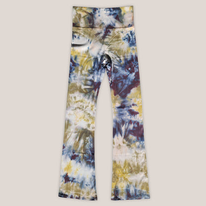 Tie-dye leggings on a beige background