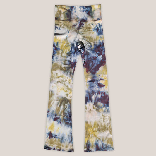 Tie-dye leggings on a beige background