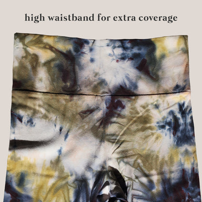 Tie-dye patterned high-waist band on a plain background with text 'high waistband for extra coverage'.
