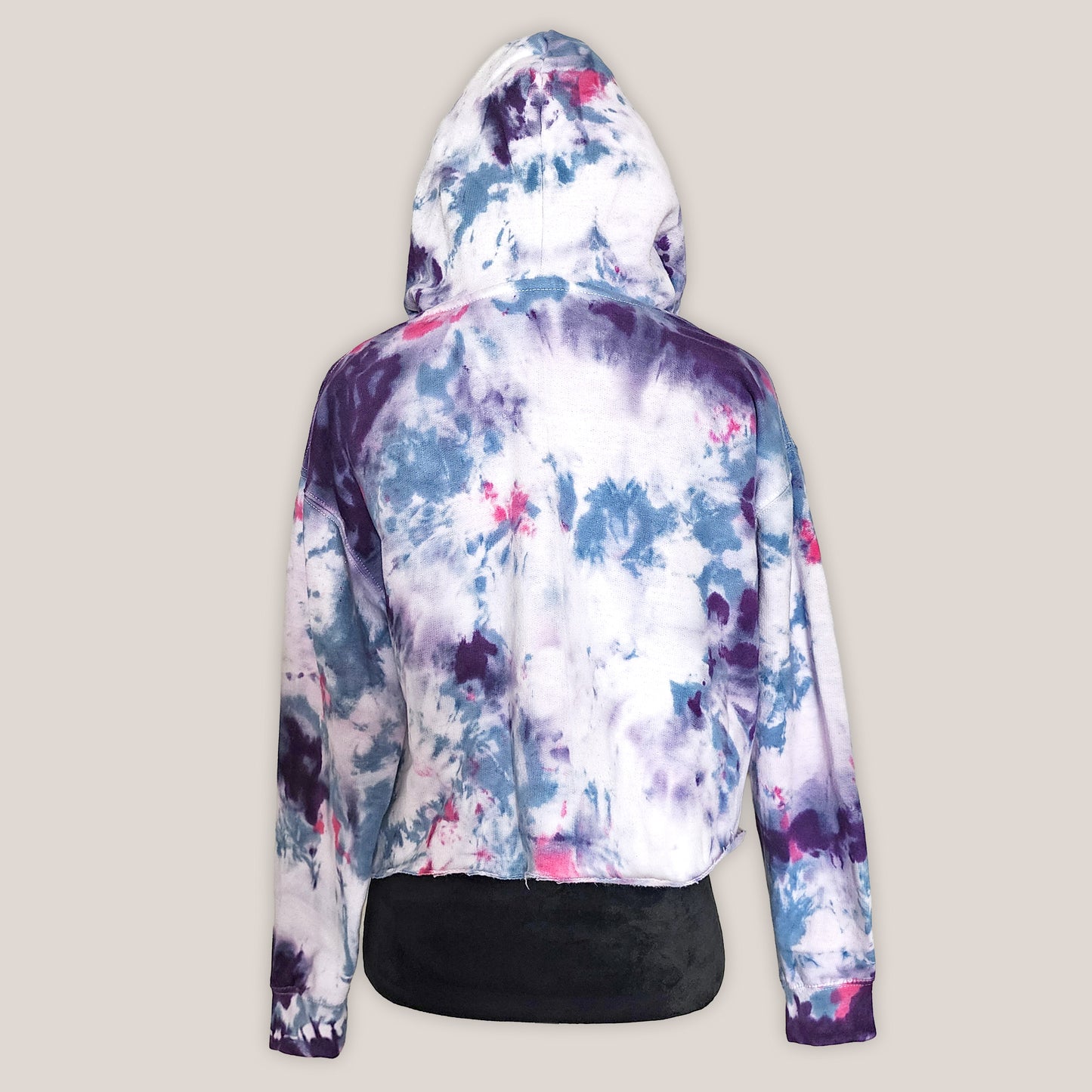Colorful tie-dye hoodie on a plain background
