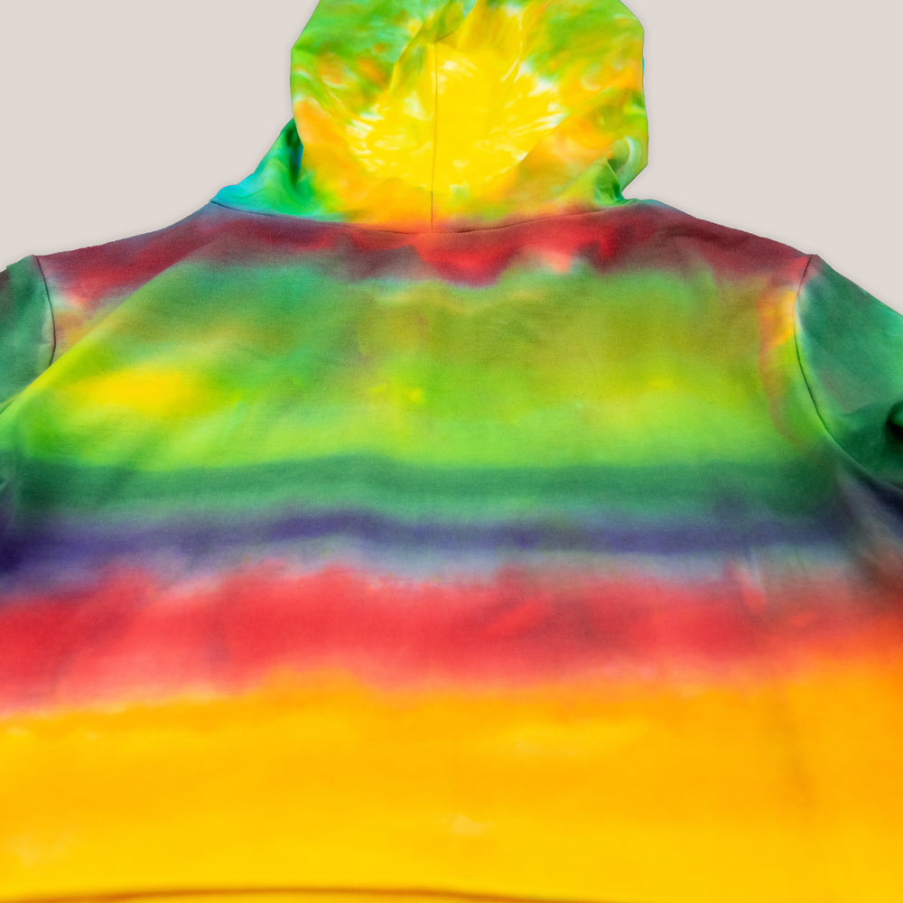 Rainbow tie dye hoodie crop top with a hood, drawstrings, and long sleeves.