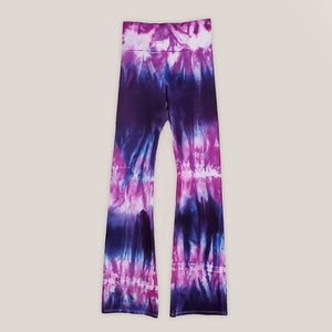 Purple and pink tie dye yoga pants with wide waistband.