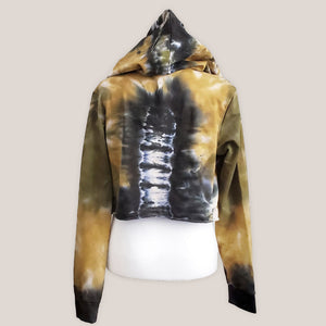 Green and black tie dye hoodie crop top with long sleeves.