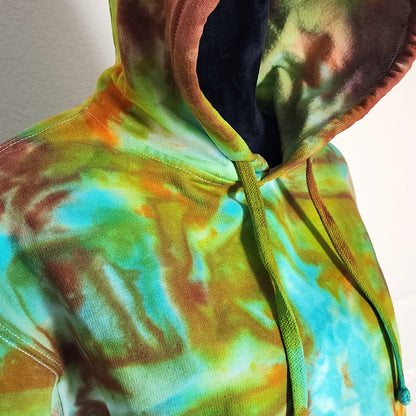 Multicolored tie-dye hoodie with a plain background