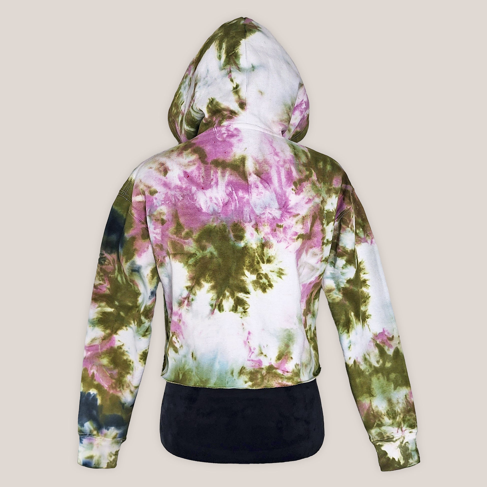 Tie dye hoodie on a beige background