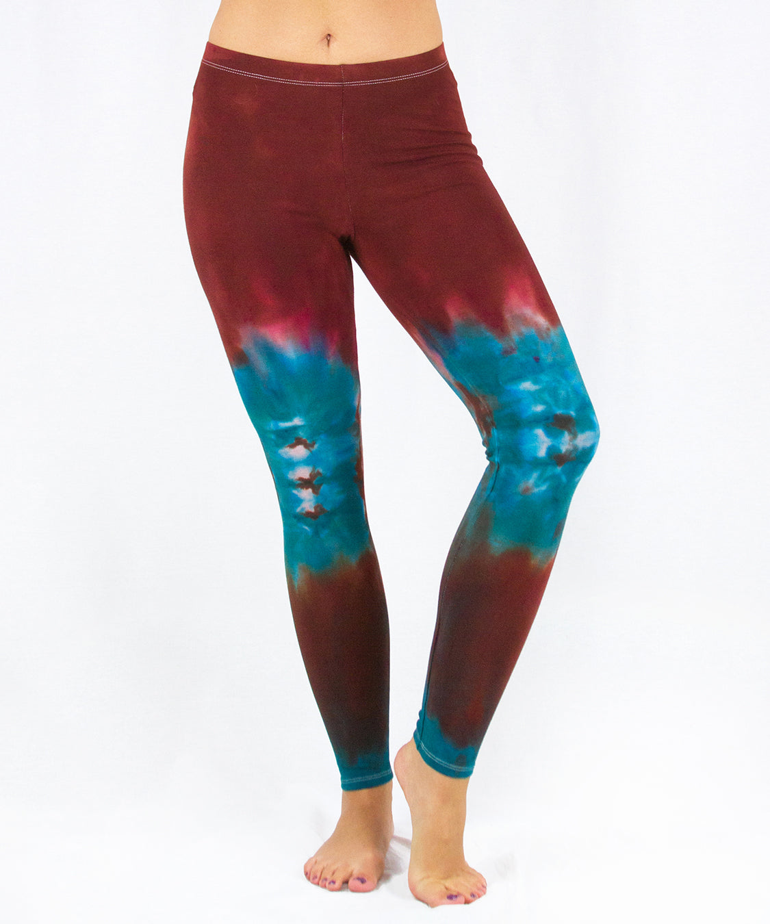 Southwest brown and teal tie dye yoga leggings made of sustainable cotton and spandex.