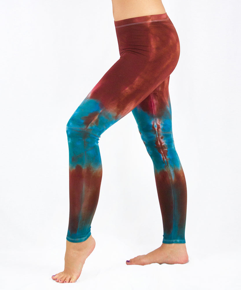 
                
                    Load image into Gallery viewer, Southwest brown and teal tie dye yoga leggings made of sustainable cotton and spandex.
                
            