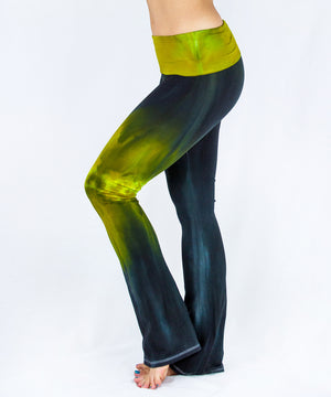 Black and green tie dye yoga pants featuring a fold over waistband by Akasha Sun.
