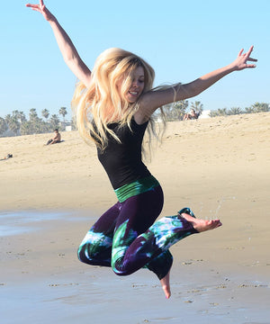 
                
                    Load image into Gallery viewer, Akasha Sun yoga pants are made of stretchy sustainable cotton, perfect for having fun.
                
            