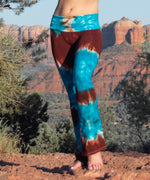 Teal and brown tie dye yoga pants with a fold over waistband by Akasha Sun.