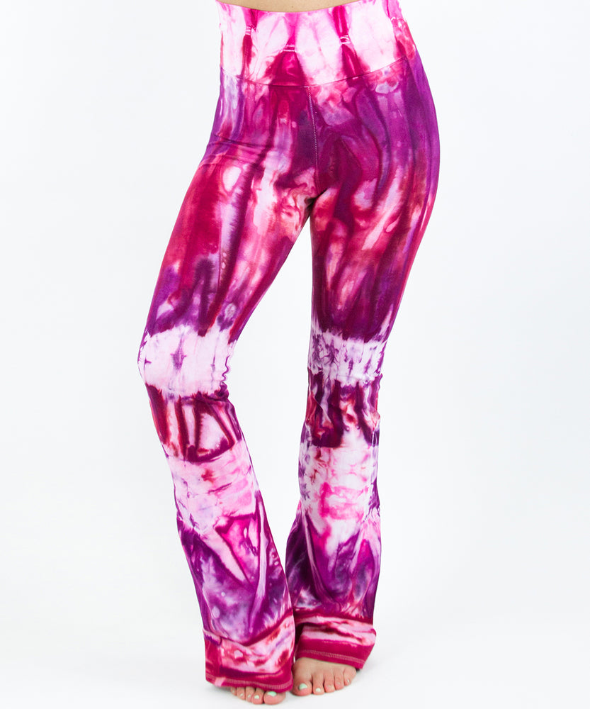 Pink, red, and purple tie dye yoga pants with a wide waistband by Akasha Sun.