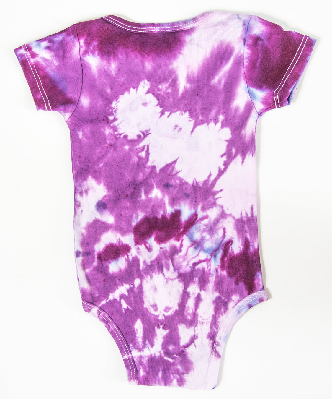 Pink tie dye bodysuit and baby hat set by Akasha Sun.  Made of organic cotton.