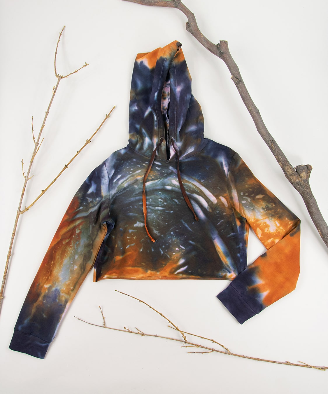 Orange and black tie dye hoodie crop top by Akasha Sun.