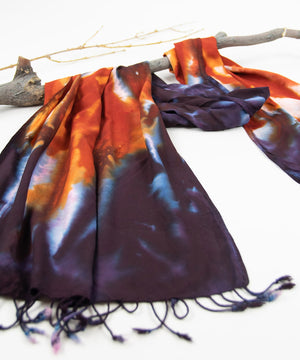 Rust and black tie dye scarf by Akasha Sun.