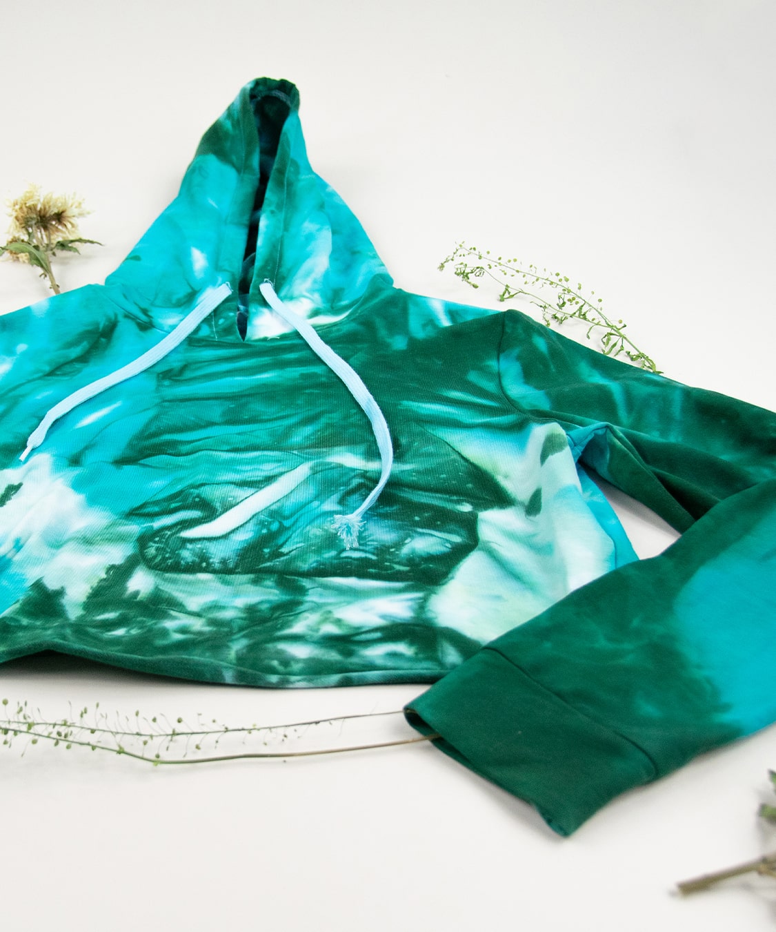 Teal and green tie dye hoodie crop top by Akasha Sun.